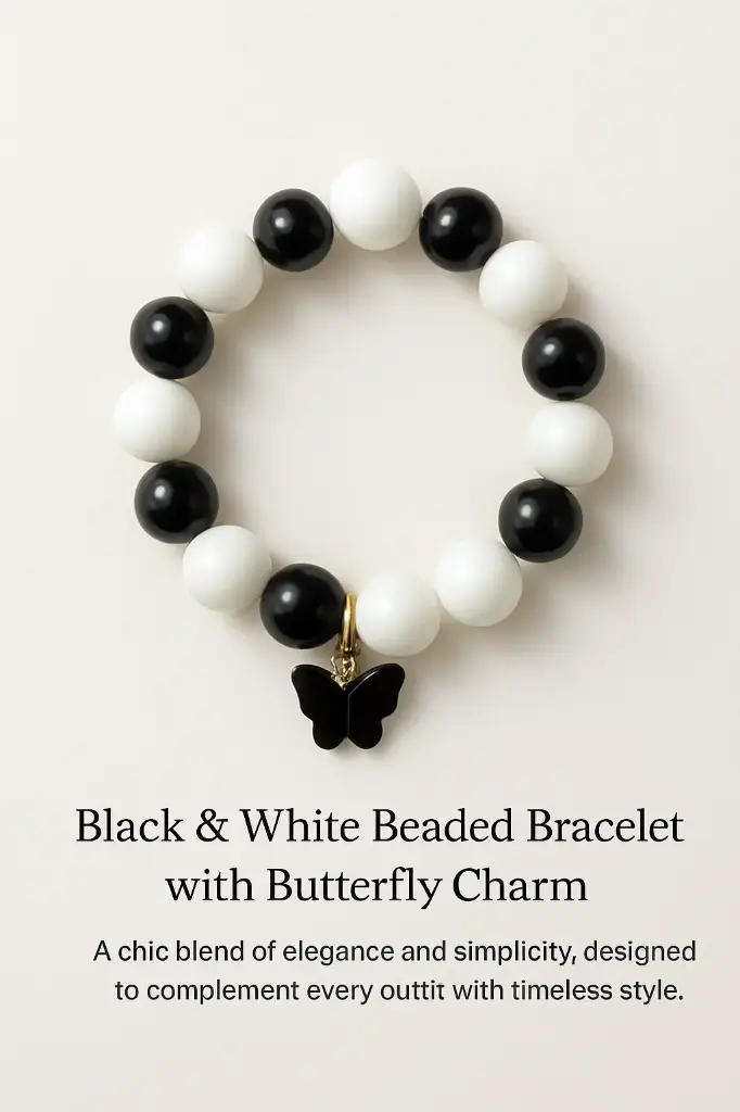  ✨ **Elegant Black & White Beaded Bracelet with Butterfly Charm** ✨