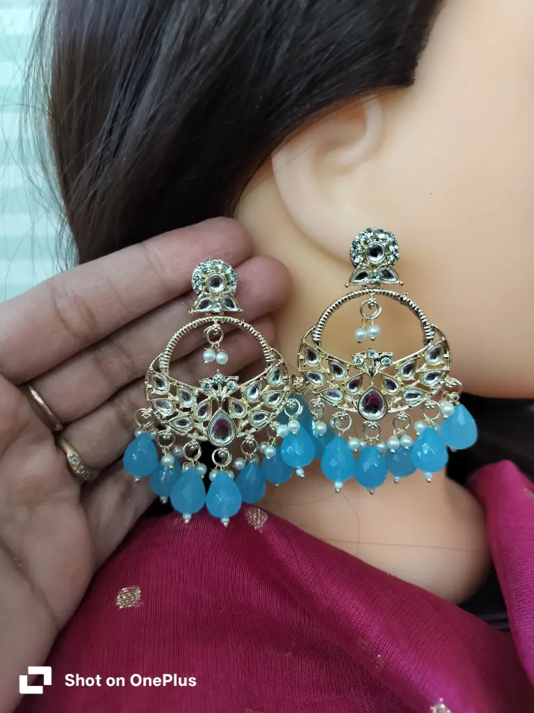 Sea blue Kundan and beads embellished Chandbali earrings. 