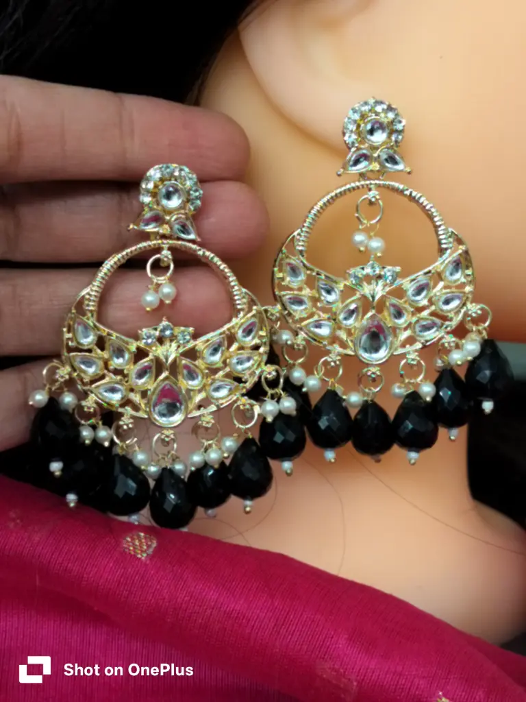 Kundan and blat beads embellished Chandbali earrings. 