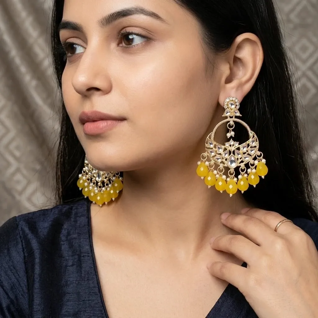gold-plated kundan chandbali earrings with yellow crystal drops and pearls. 