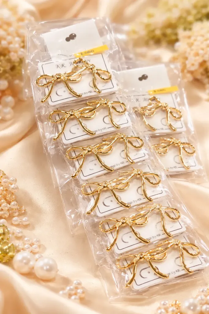 Gold plated bow earrings big