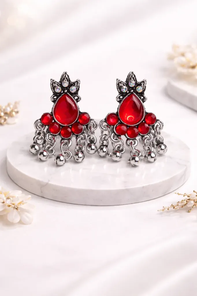 Red stone oxidised drop earrings