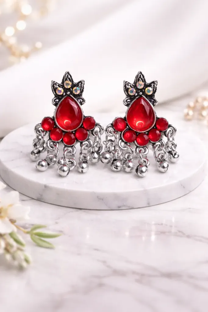 Red stone oxidised drop earrings