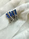 Oxidized Silver Peacock Jhumka Earrings – Royal Blue Accents