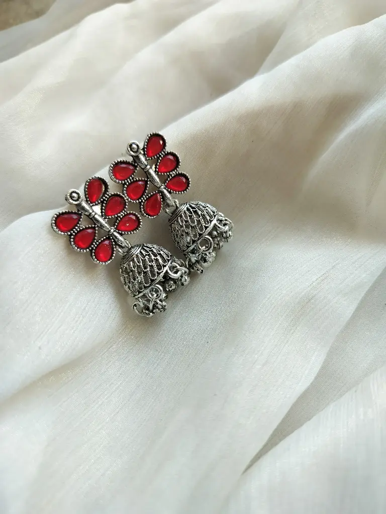 Oxidized Silver Peacock Jhumka Earrings – Vibrant Red Accents