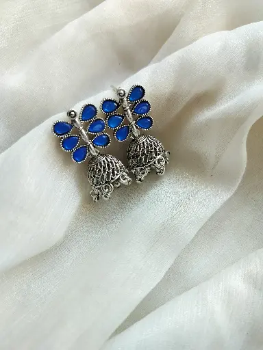 Oxidized Silver Peacock Jhumka Earrings – Royal Blue Accents